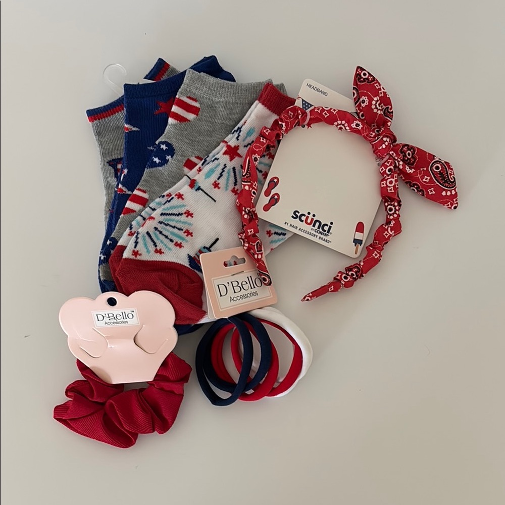 Bundle of hair accessories and socks.